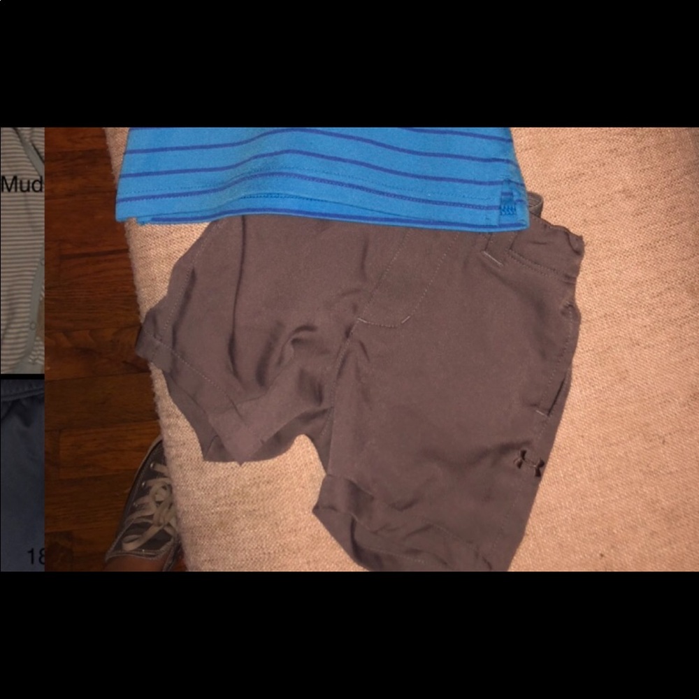 Toddler UA shirt and dress shorts.